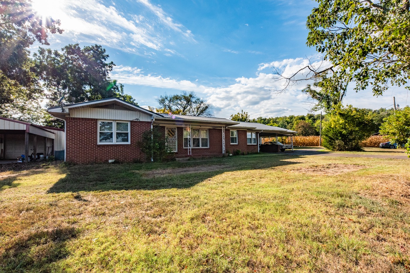 1318 Vise Loop Decaturville, TN 38329 - Photo 7 of 61 a front view of a house with a yard