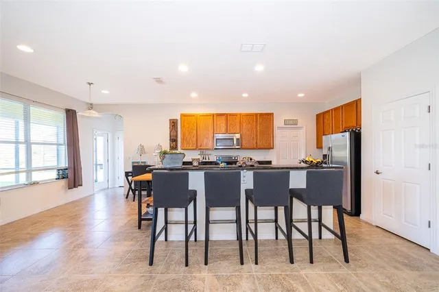 a view of dining room with furniture and chandelier