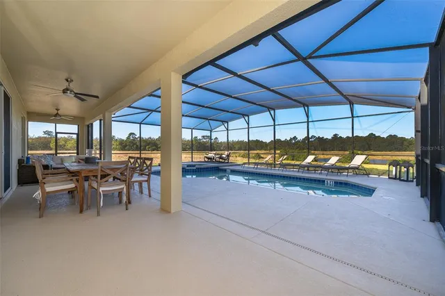 a kitchen with stainless steel appliances kitchen island granite countertop lots of counter top space