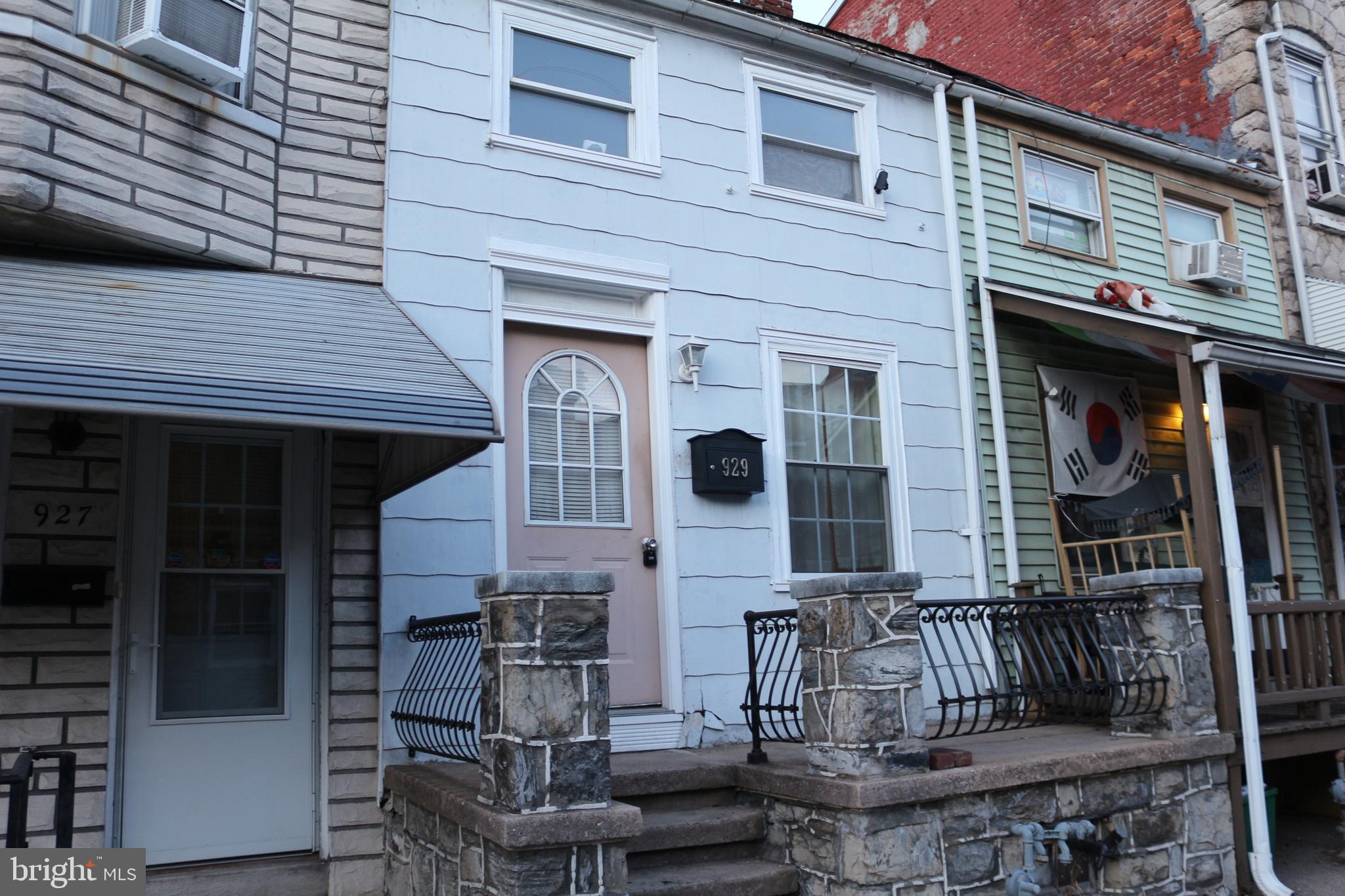 929 Washington Street Reading, PA 19601 - Photo 5 of 14 a front view of a house with glass windows