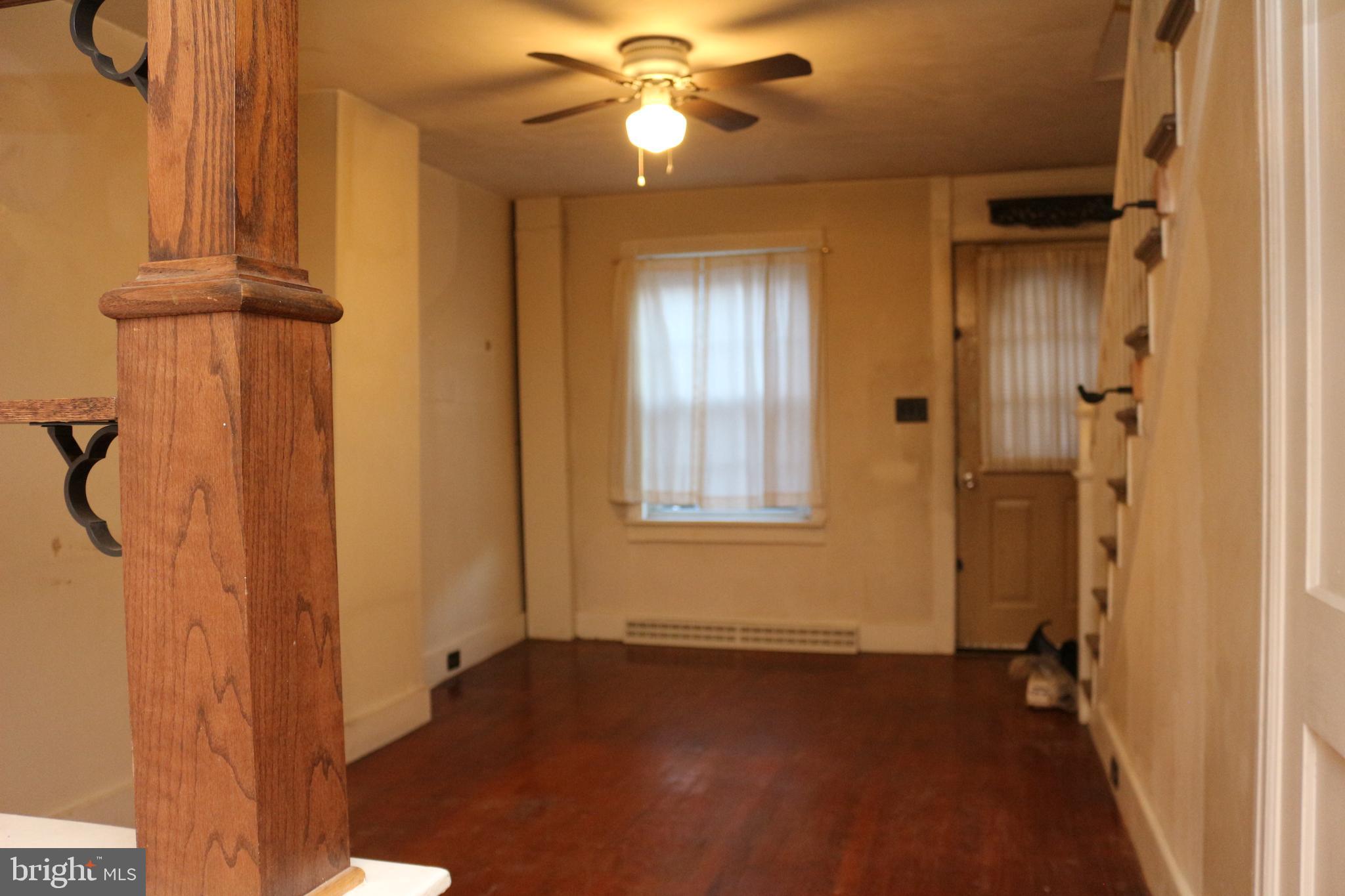 929 Washington Street Reading, PA 19601 - Photo 6 of 14 a view of empty room with window and ceiling fan