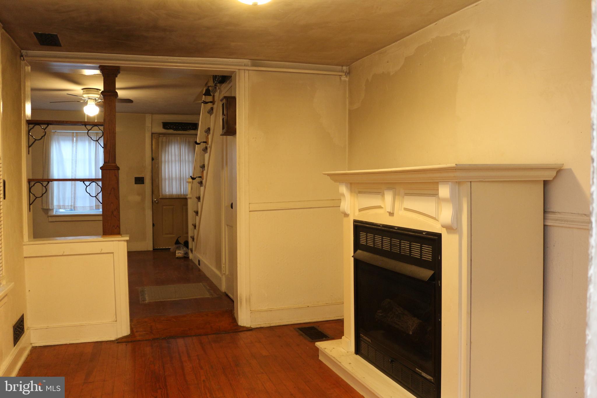 929 Washington Street Reading, PA 19601 - Photo 7 of 14 a view of walk in closet with wooden floor