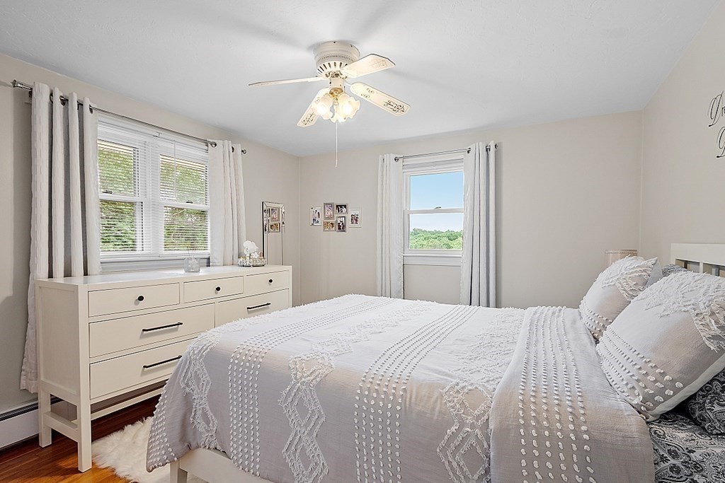 296 St Nicholas Avenue Worcester, MA 01606 - Photo 11 of 32 a bedroom with a bed and a window