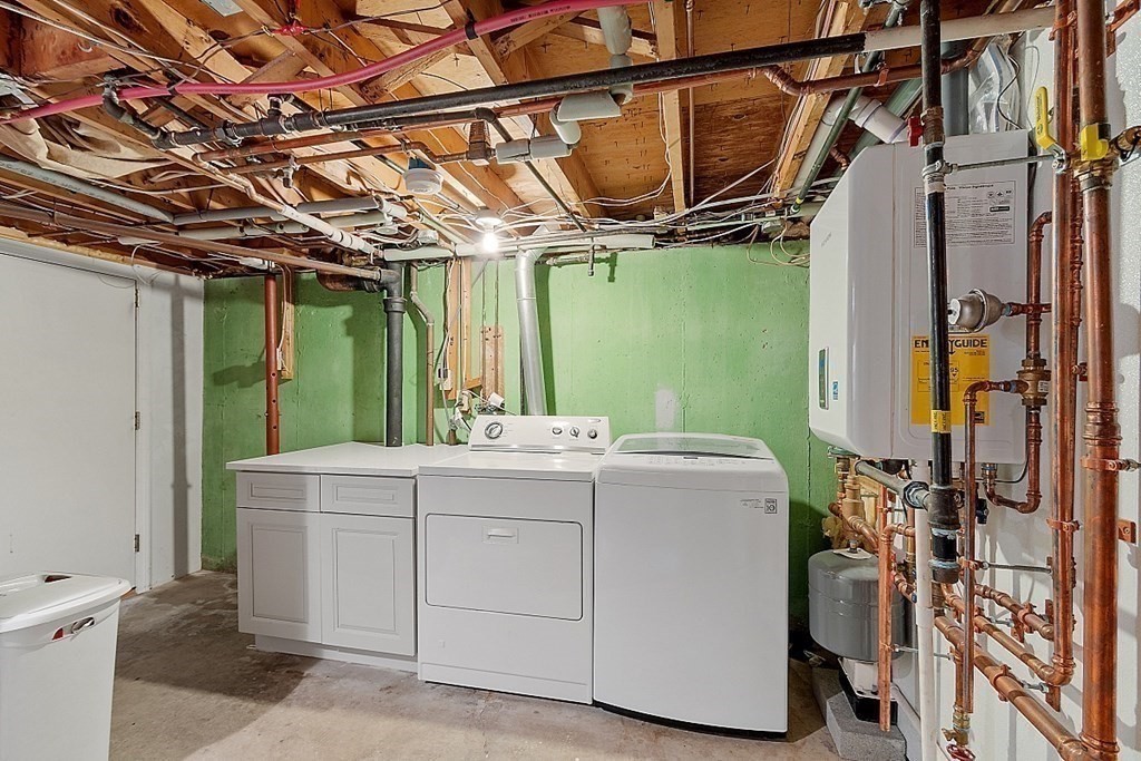 296 St Nicholas Avenue Worcester, MA 01606 - Photo 23 of 32 a utility room with a washer and dryer