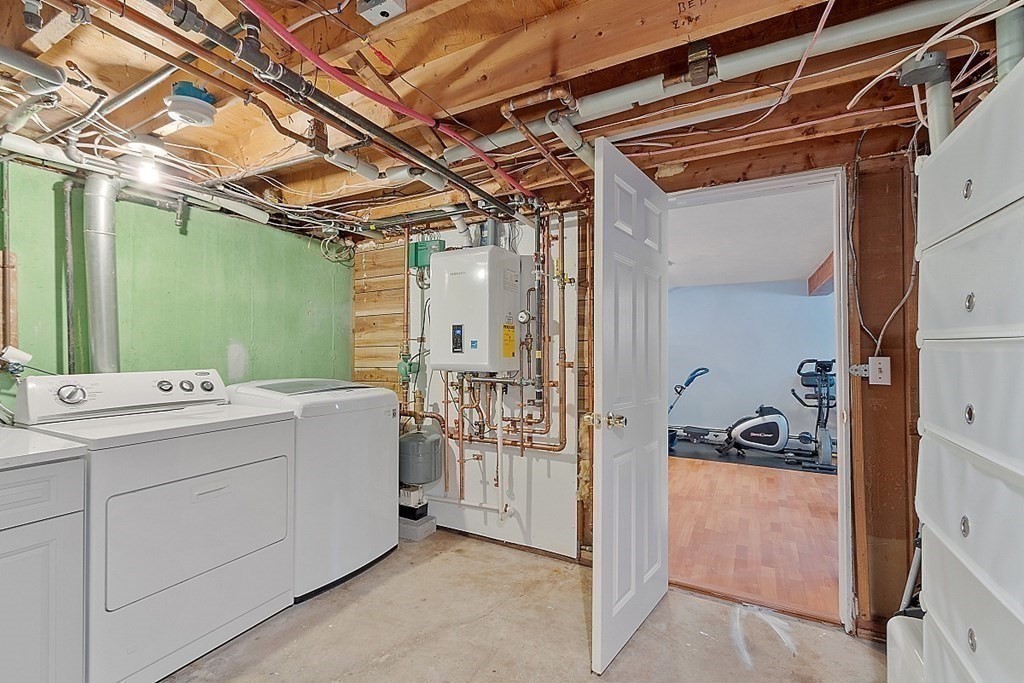 296 St Nicholas Avenue Worcester, MA 01606 - Photo 24 of 32 a utility room with closet dryer and washer