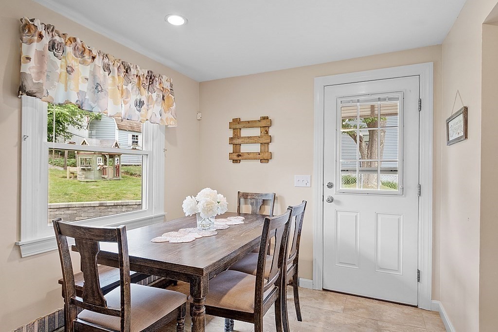 296 St Nicholas Avenue Worcester, MA 01606 - Photo 6 of 32 a view of a dining room with furniture window and outside view