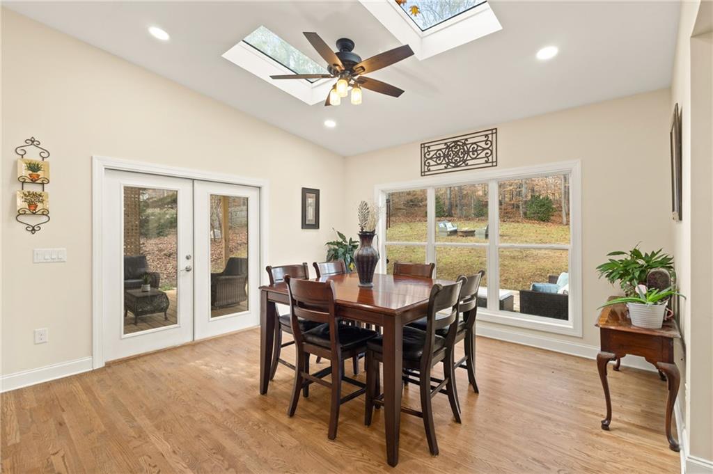 67 Pointer Lane Braselton, GA 30517 - Photo 18 of 45 a view of a dining room with furniture and wooden floor