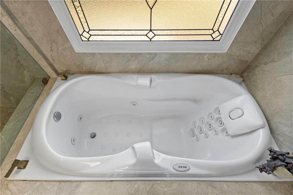 67 Pointer Lane Braselton, GA 30517 - Photo 27 of 45 a bathroom with a bathtub