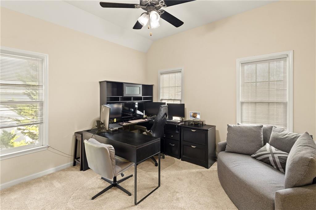 67 Pointer Lane Braselton, GA 30517 - Photo 33 of 45 a living room with furniture and a window