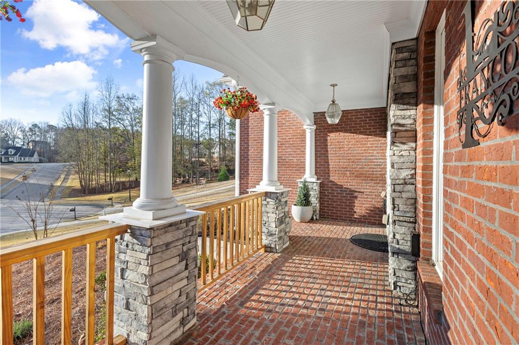 67 Pointer Lane Braselton, GA 30517 - Photo 6 of 45 a view of a balcony with wooden floor