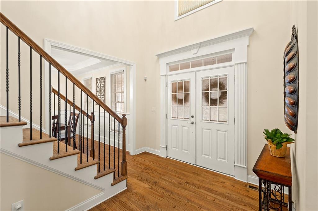 67 Pointer Lane Braselton, GA 30517 - Photo 7 of 45 a view of entryway with wooden floor and stairs