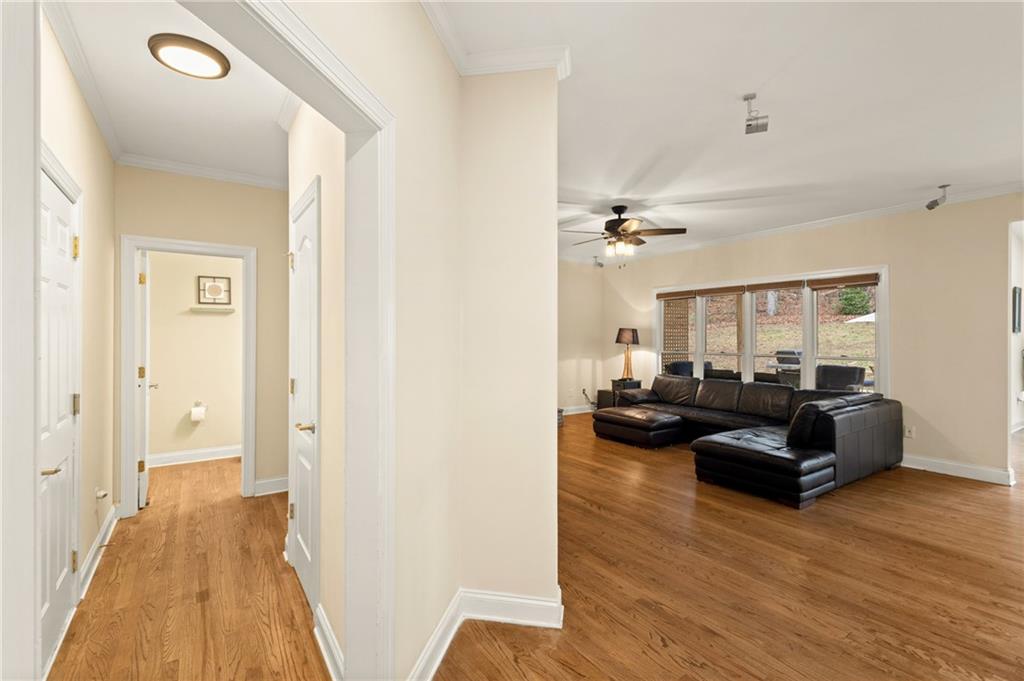 67 Pointer Lane Braselton, GA 30517 - Photo 10 of 45 a living room with furniture and a wooden floor