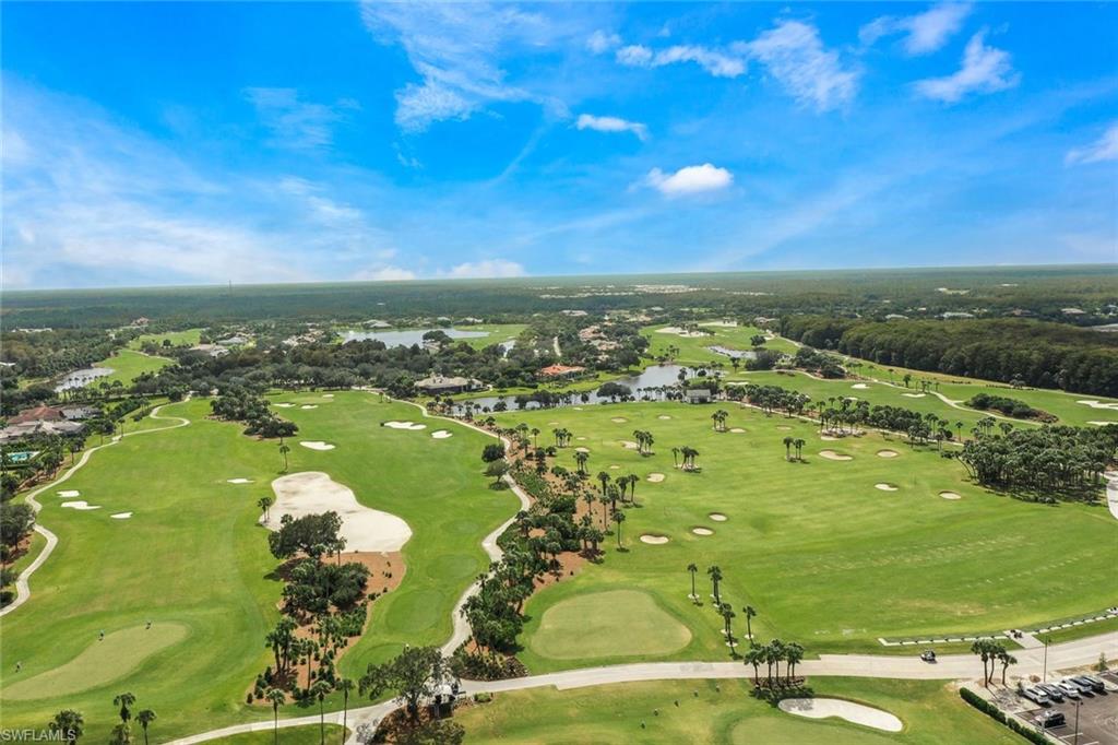 12840 Kinross Lane Naples, FL 34120 - Photo 44 of 44 a view of a lake with houses