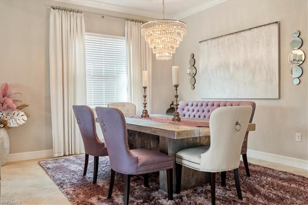 12840 Kinross Lane Naples, FL 34120 - Photo 7 of 44 a view of a dining room with furniture window and outside view