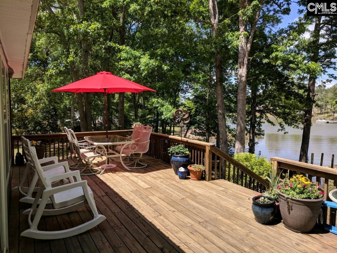 957 Rocky Point Circle Ridgeway, SC 29130 - Photo 18 of 23 a view of a chairs and tables in the patio