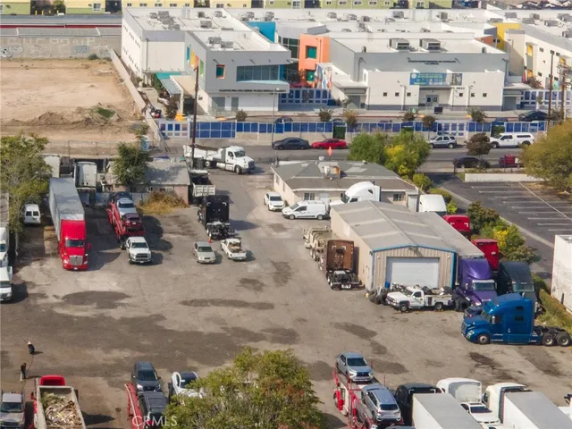 a view of a backyard with furniture and a couch