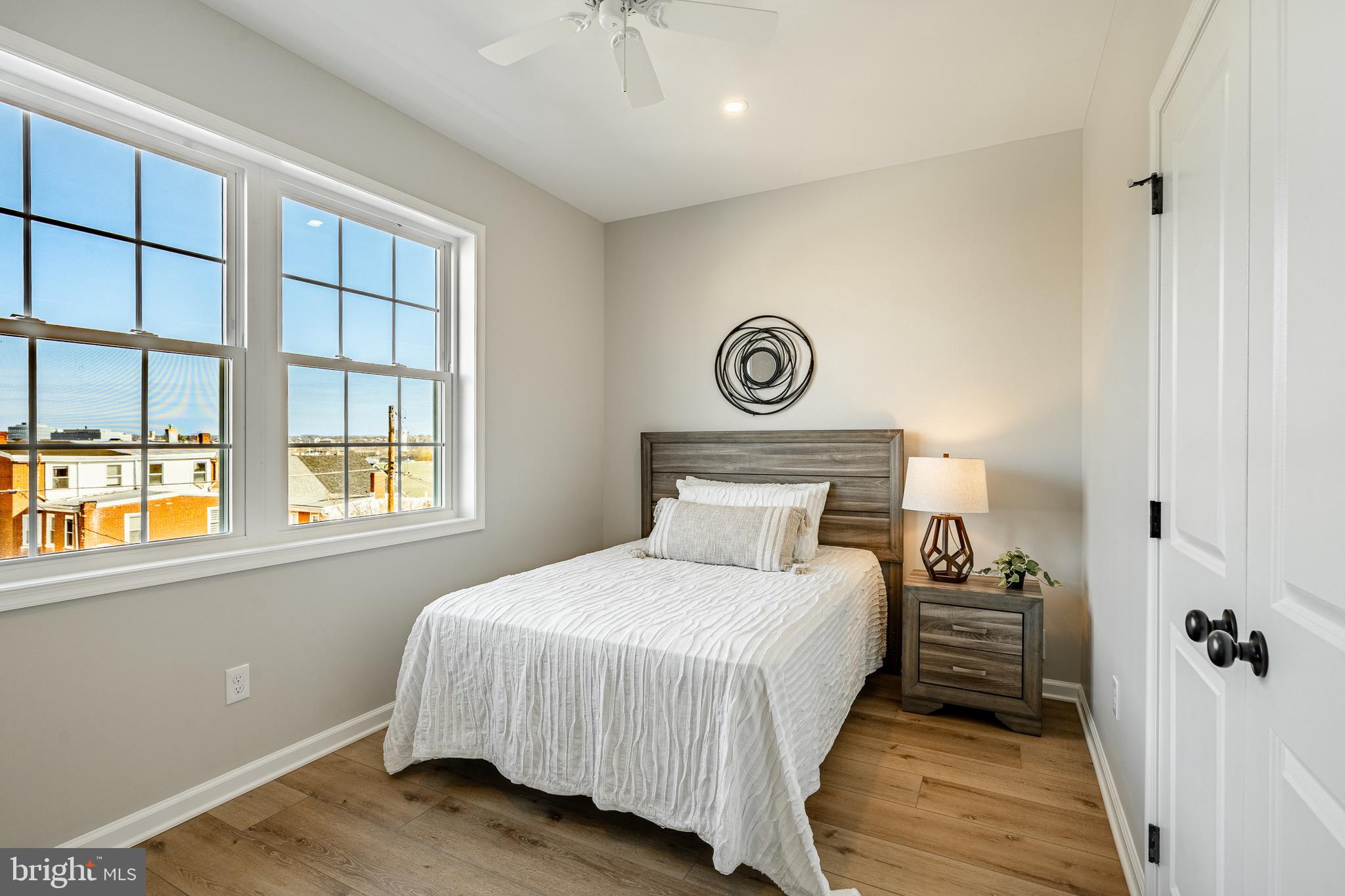 523 Grove Street Bridgeport, PA 19405 - Photo 11 of 25 a bedroom with a bed and a window