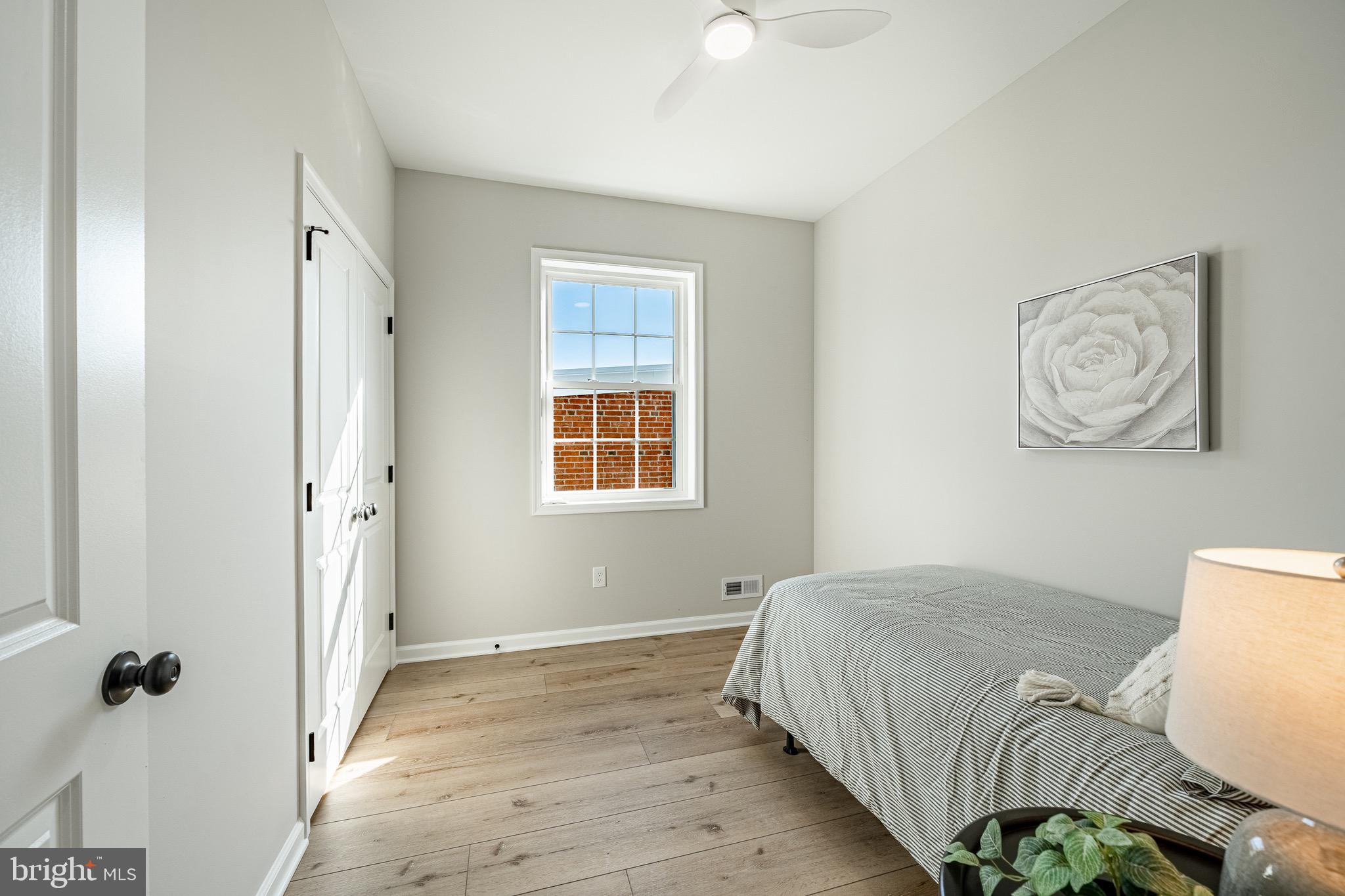 523 Grove Street Bridgeport, PA 19405 - Photo 12 of 25 a bedroom with a bed and a window