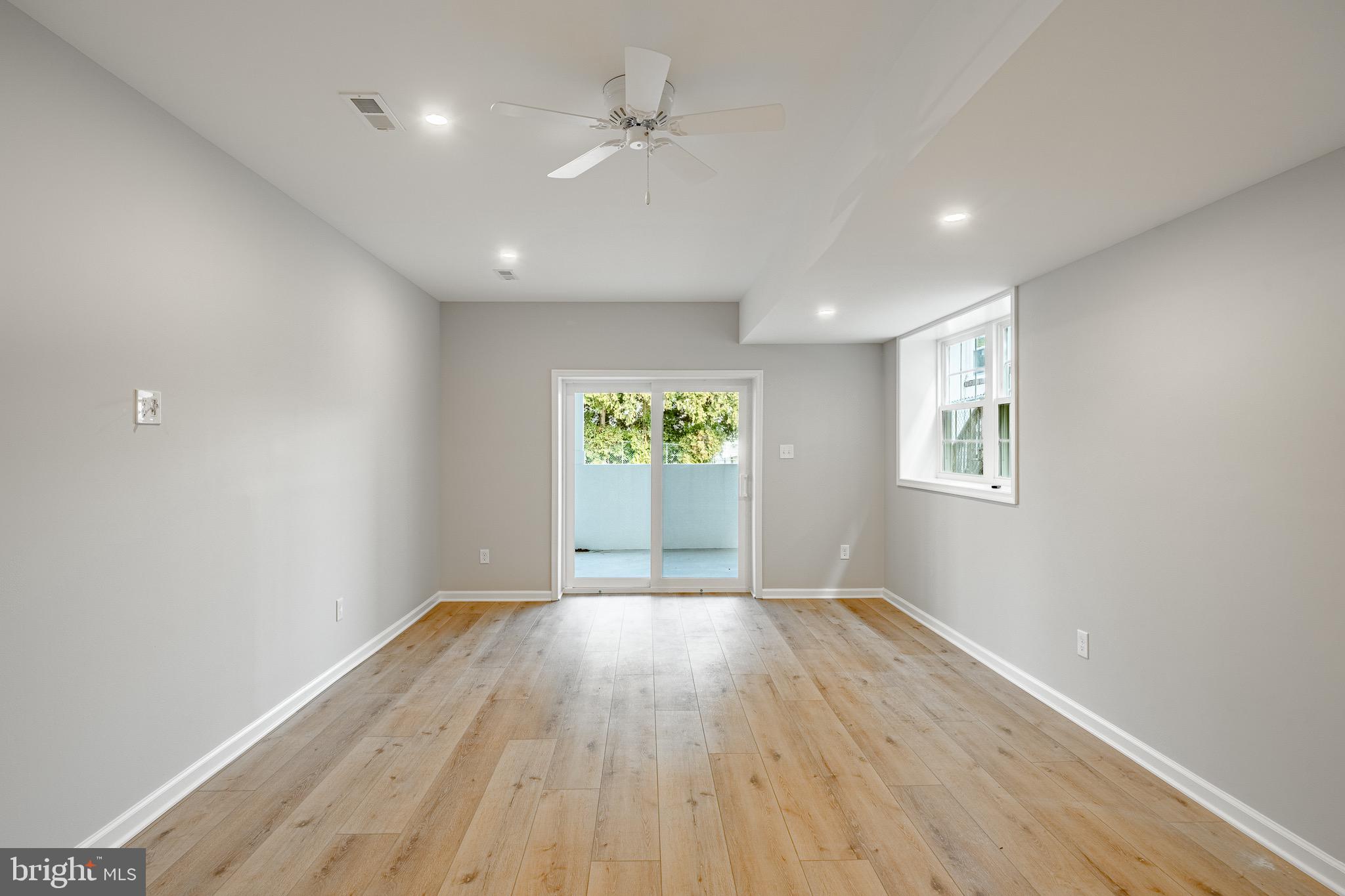 523 Grove Street Bridgeport, PA 19405 - Photo 14 of 25 wooden floor in an empty room with a window