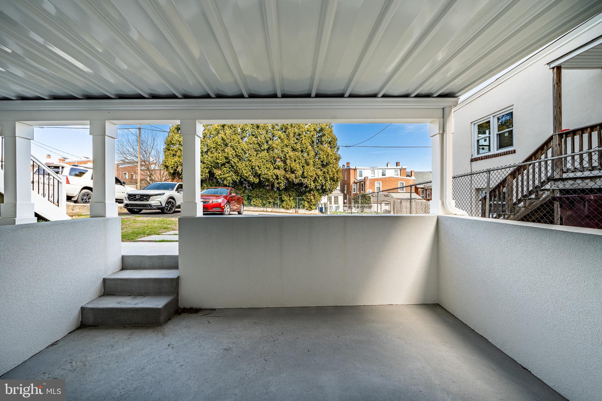 523 Grove Street Bridgeport, PA 19405 - Photo 17 of 25 a living room with fireplace furniture and a large window