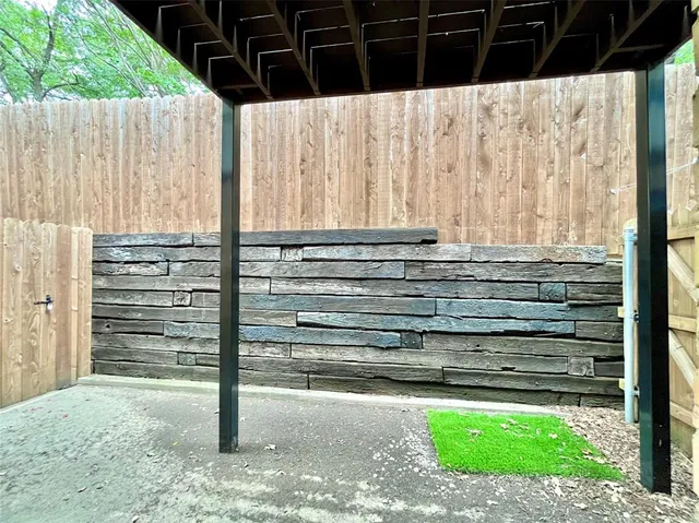 a backyard of a house with seating space