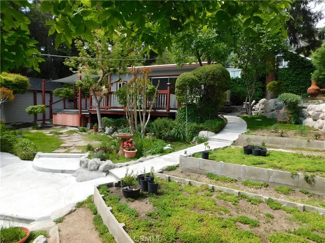a kitchen with stainless steel appliances granite countertop a sink and a counter
