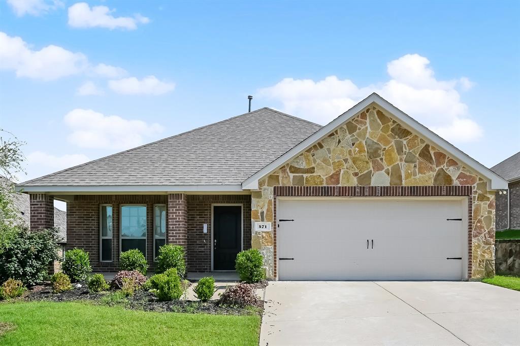 front view of house with a yard