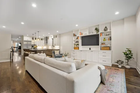 a view of entryway with wooden floor