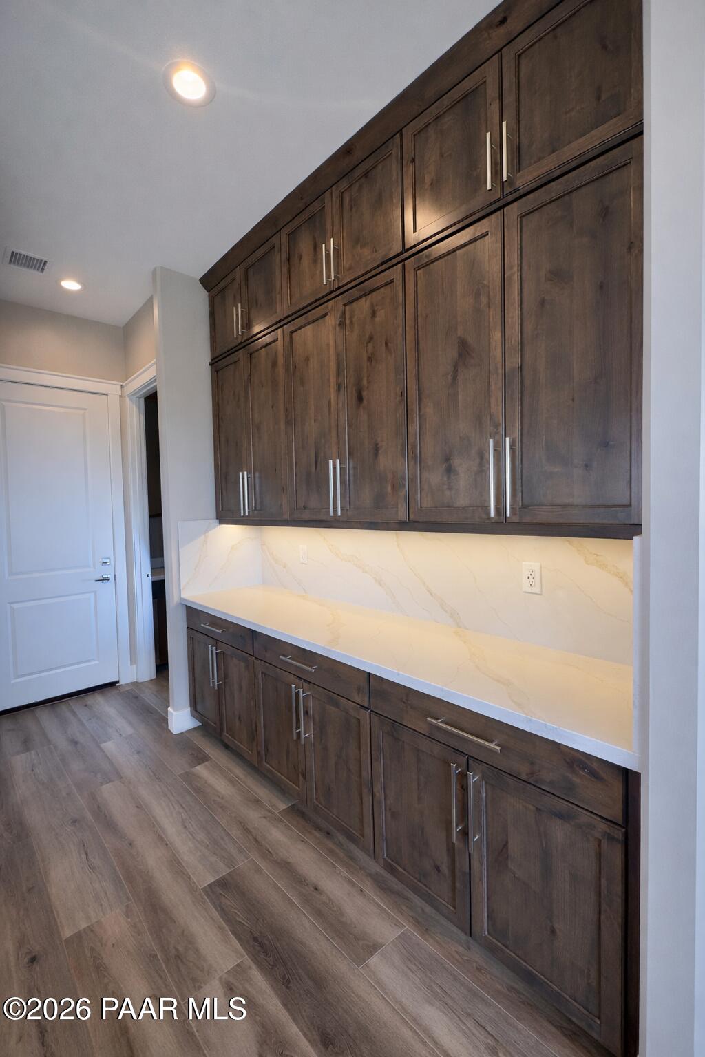 1941 Ventnor Circle Prescott, AZ 86301 - Photo 19 of 41 a view of an empty room with wooden floor