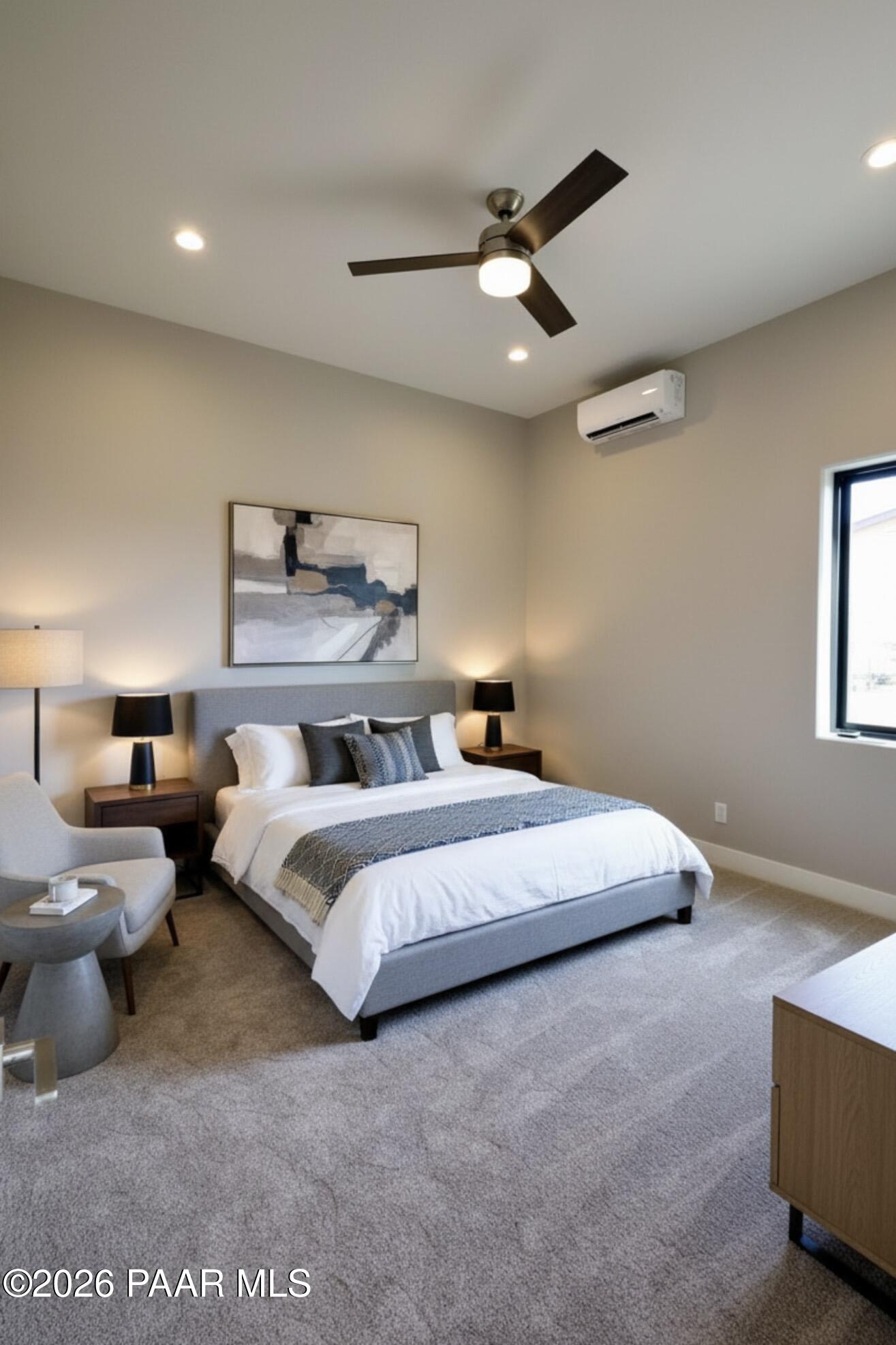 1941 Ventnor Circle Prescott, AZ 86301 - Photo 34 of 41 a spacious bedroom with a bed and window