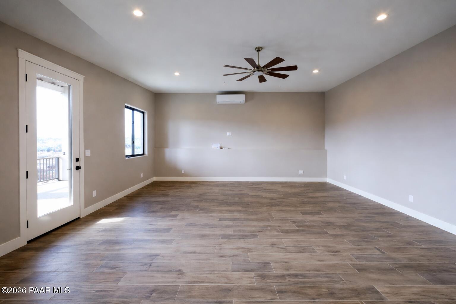1941 Ventnor Circle Prescott, AZ 86301 - Photo 38 of 41 a view of empty room with wooden floor and fan