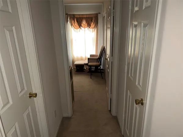 a room with furniture and a window