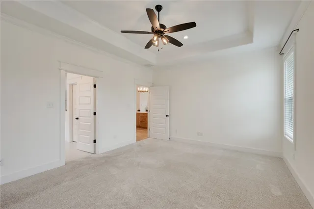 a bathroom with a shower sink vanity and a mirror