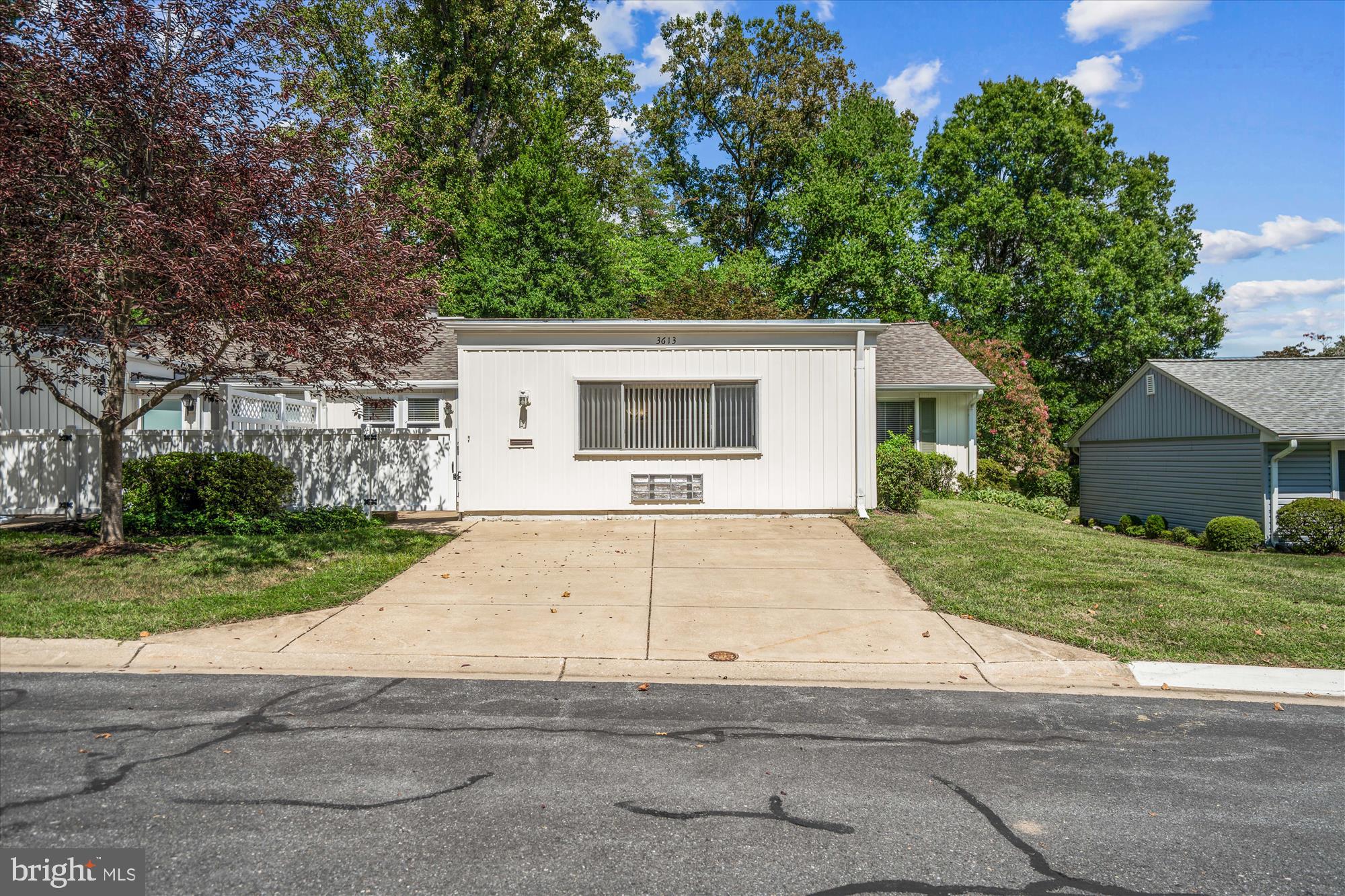 3613 Edelmar Terrace, Unit 131B Silver Spring, MD 20906 - Photo 14 of 24 front view of a house with a yard