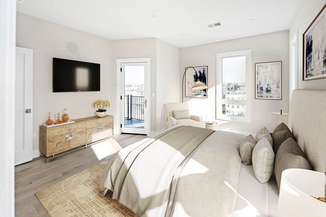 a kitchen with stainless steel appliances a stove top oven a sink and a refrigerator