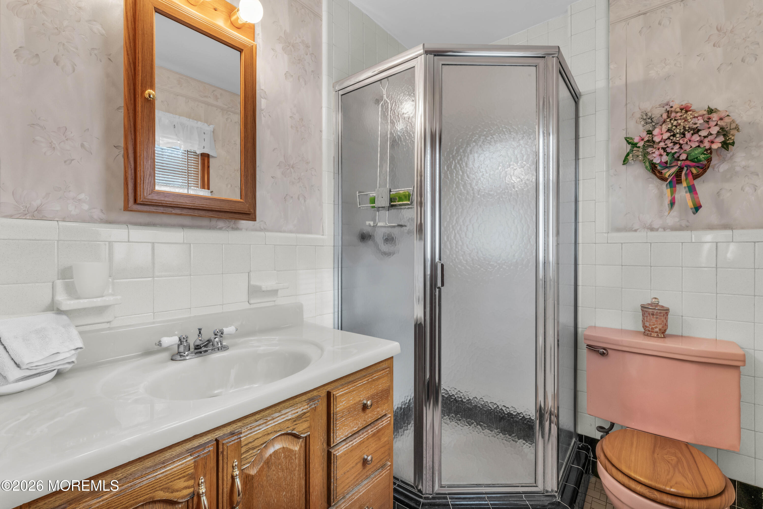 511 Robin Hood Road Brick, NJ 08724 - Photo 14 of 30 a bathroom with a granite countertop sink toilet and shower