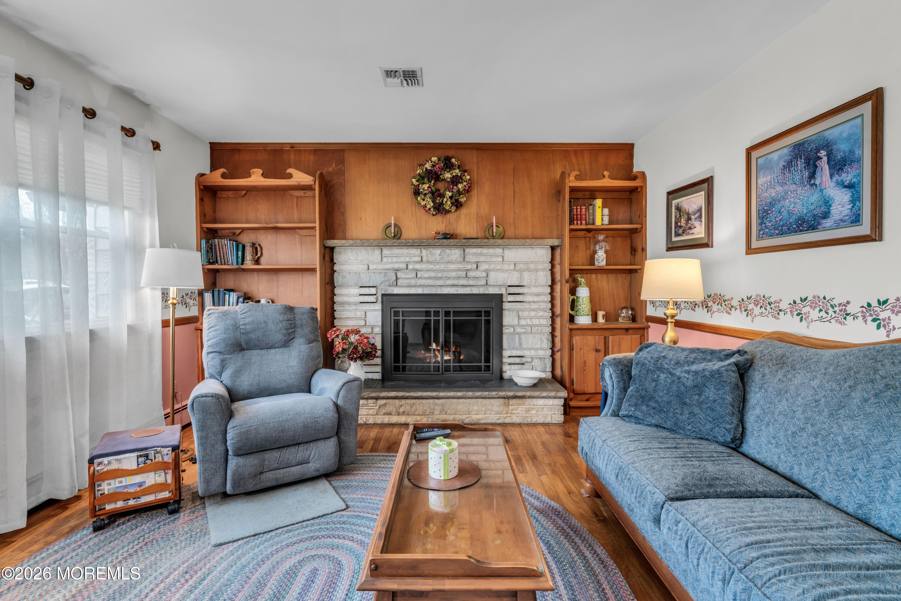 511 Robin Hood Road Brick, NJ 08724 - Photo 2 of 30 a living room with furniture and a fireplace