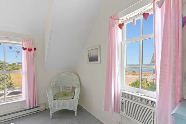 a front view of a house with a swimming pool