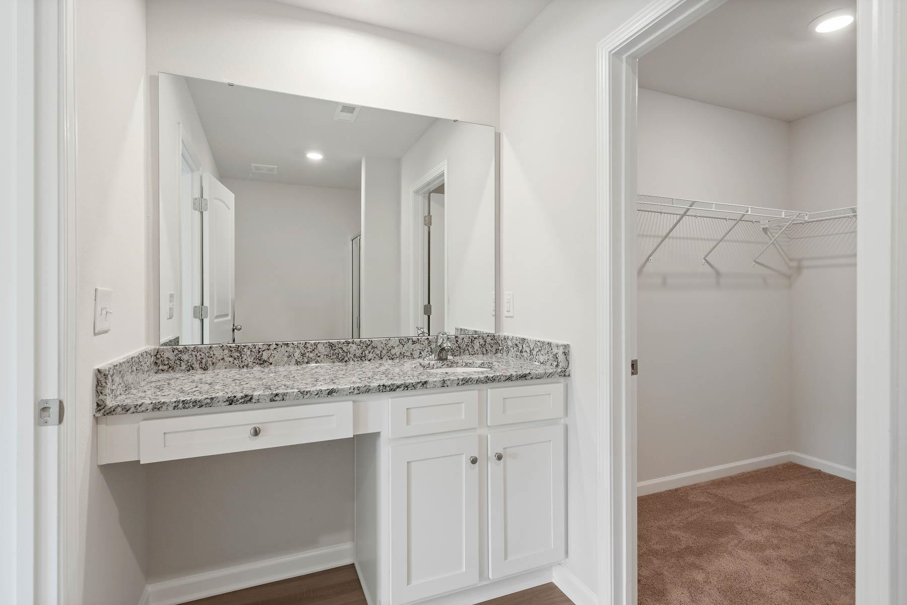 96 Crow Field Street Roxboro, NC 27574 - Photo 14 of 17 a bathroom with a granite countertop sink and a mirror