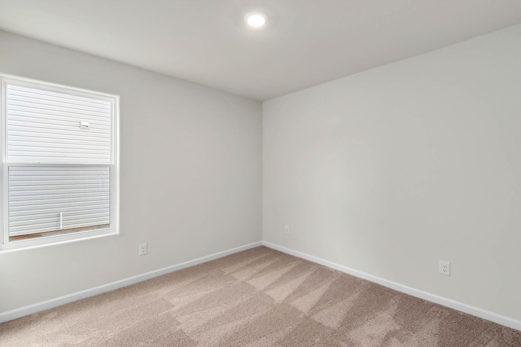96 Crow Field Street Roxboro, NC 27574 - Photo 15 of 17 an empty room with a window