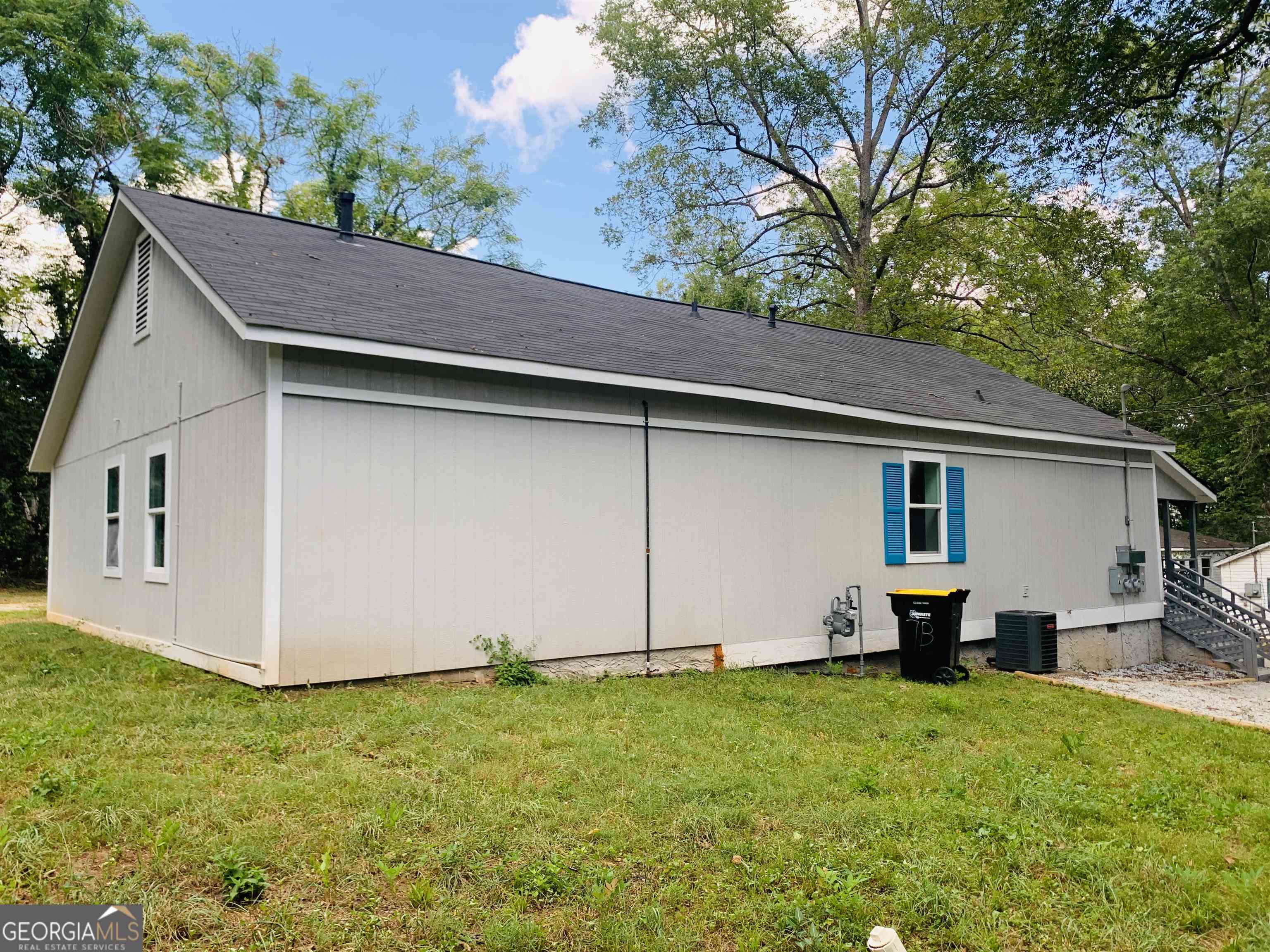 7 Burdette Place, Unit A Newnan, GA 30263 - Photo 18 of 18 a view of a backyard