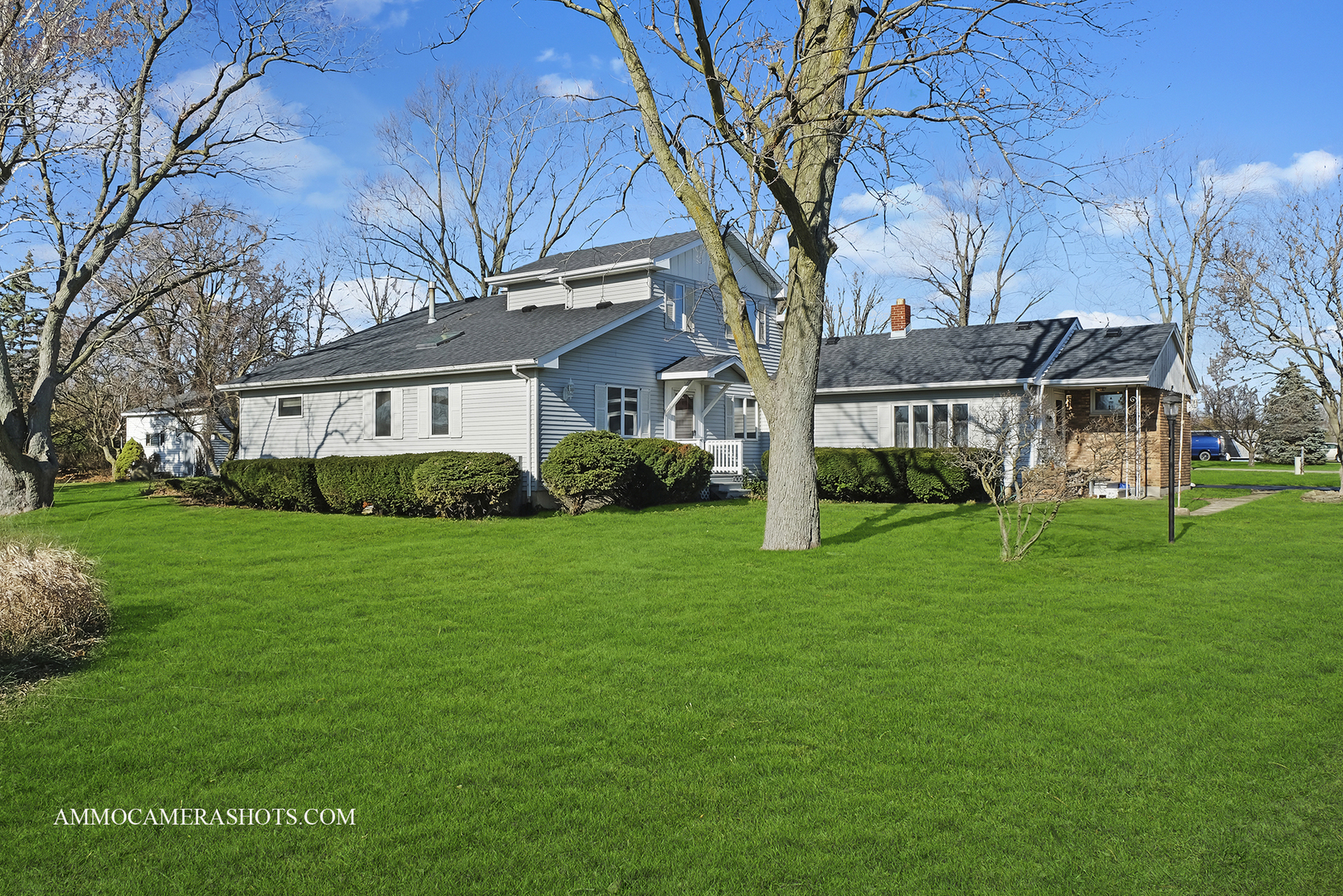 2020 Church Road Aurora, IL 60505 - Photo 1 of 37 a front view of a house with a yard and trees