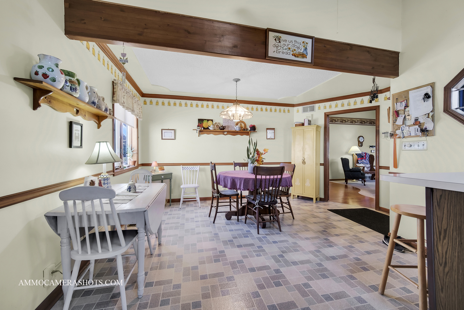 2020 Church Road Aurora, IL 60505 - Photo 12 of 37 a view of a dining room with furniture and a chandelier