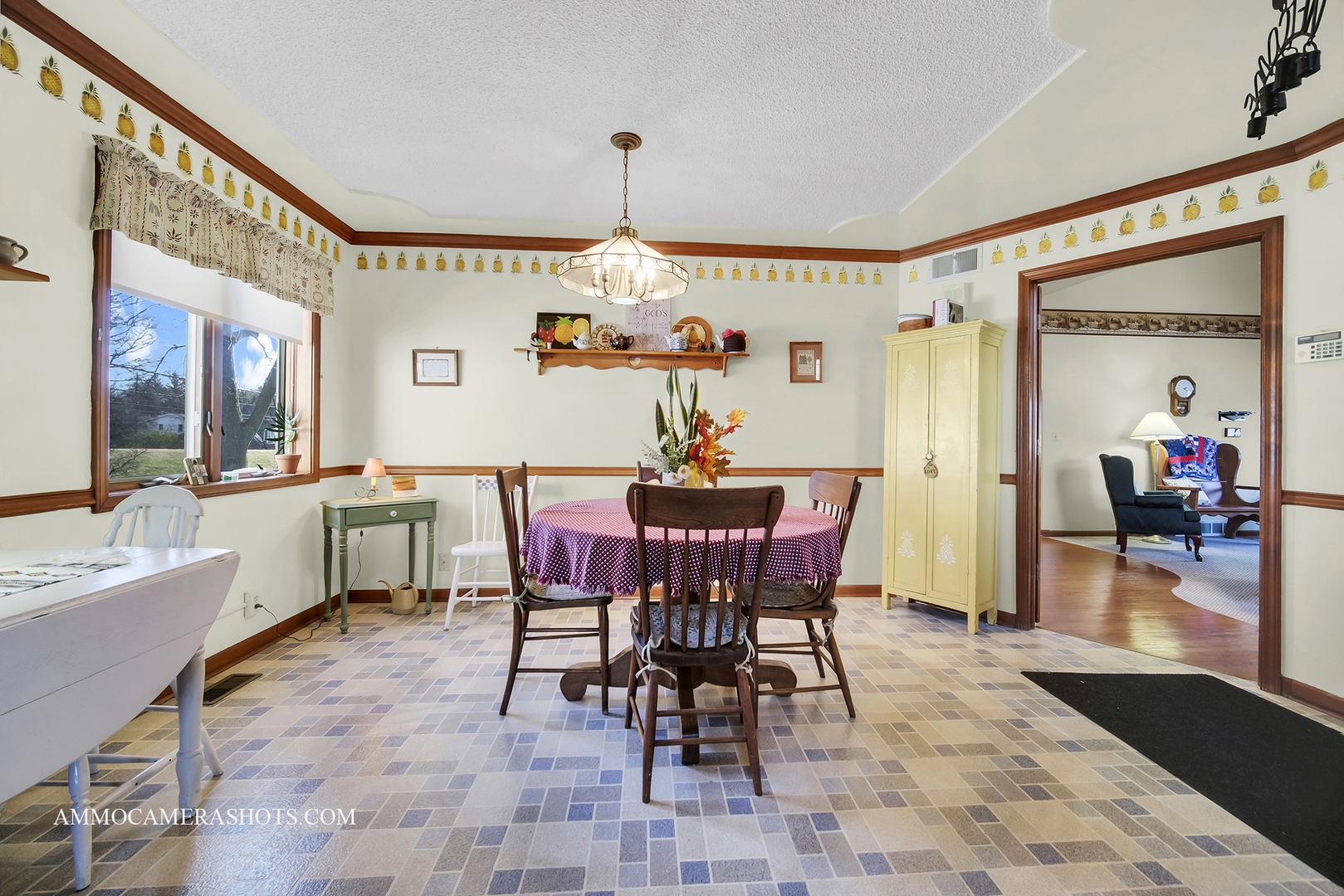 2020 Church Road Aurora, IL 60505 - Photo 13 of 37 a dining room with furniture a chandelier and wooden floor