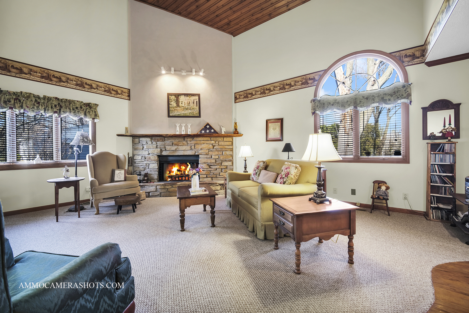 2020 Church Road Aurora, IL 60505 - Photo 14 of 37 a living room with furniture a fireplace and a large window