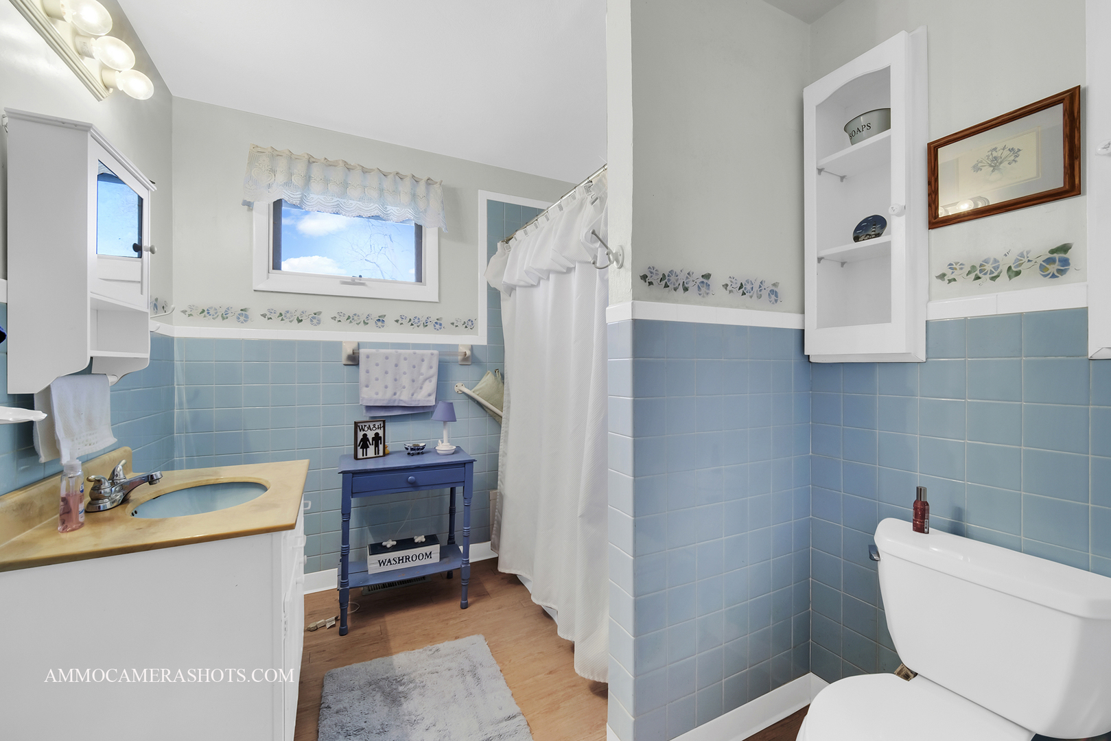 2020 Church Road Aurora, IL 60505 - Photo 21 of 37 a bathroom with a sink a toilet and mirror