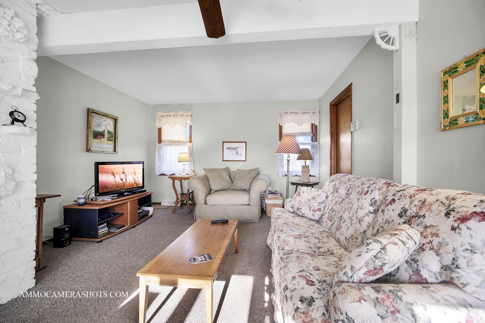 2020 Church Road Aurora, IL 60505 - Photo 23 of 37 a living room with furniture and a flat screen tv