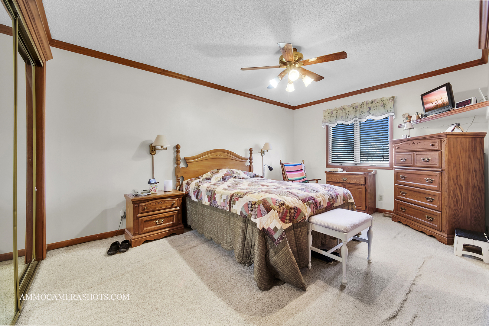 2020 Church Road Aurora, IL 60505 - Photo 31 of 37 a bedroom with a bed and a chandelier
