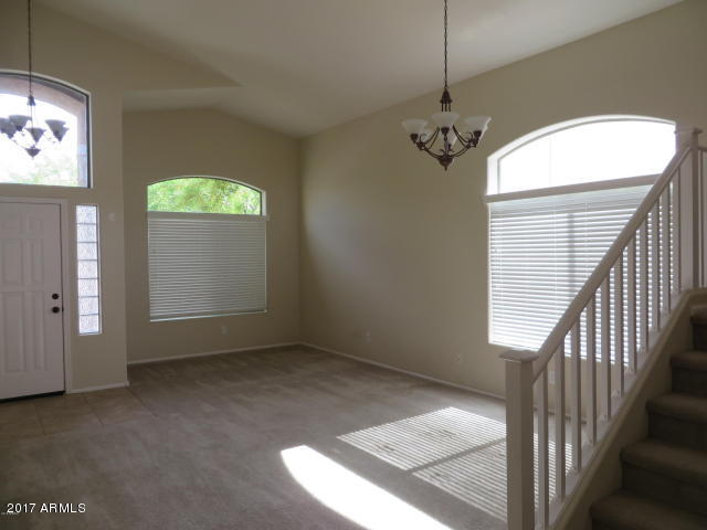 2406 West Via Dona Road Phoenix, AZ 85085 - Photo 4 of 23 Bright and Cheerful Living & Dining Room