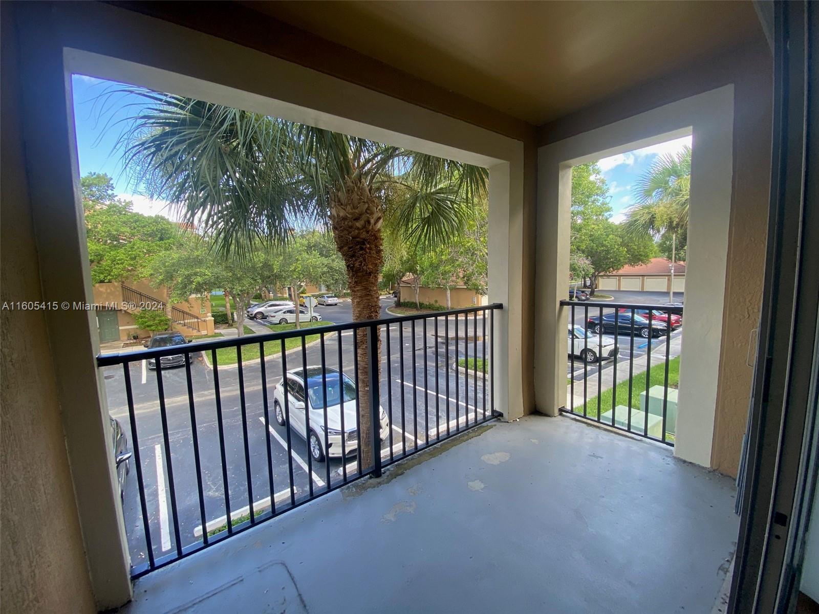 8050 North Nob Hill Road, Unit 201 Tamarac, FL 33321 - Photo 16 of 16 a view of a porch